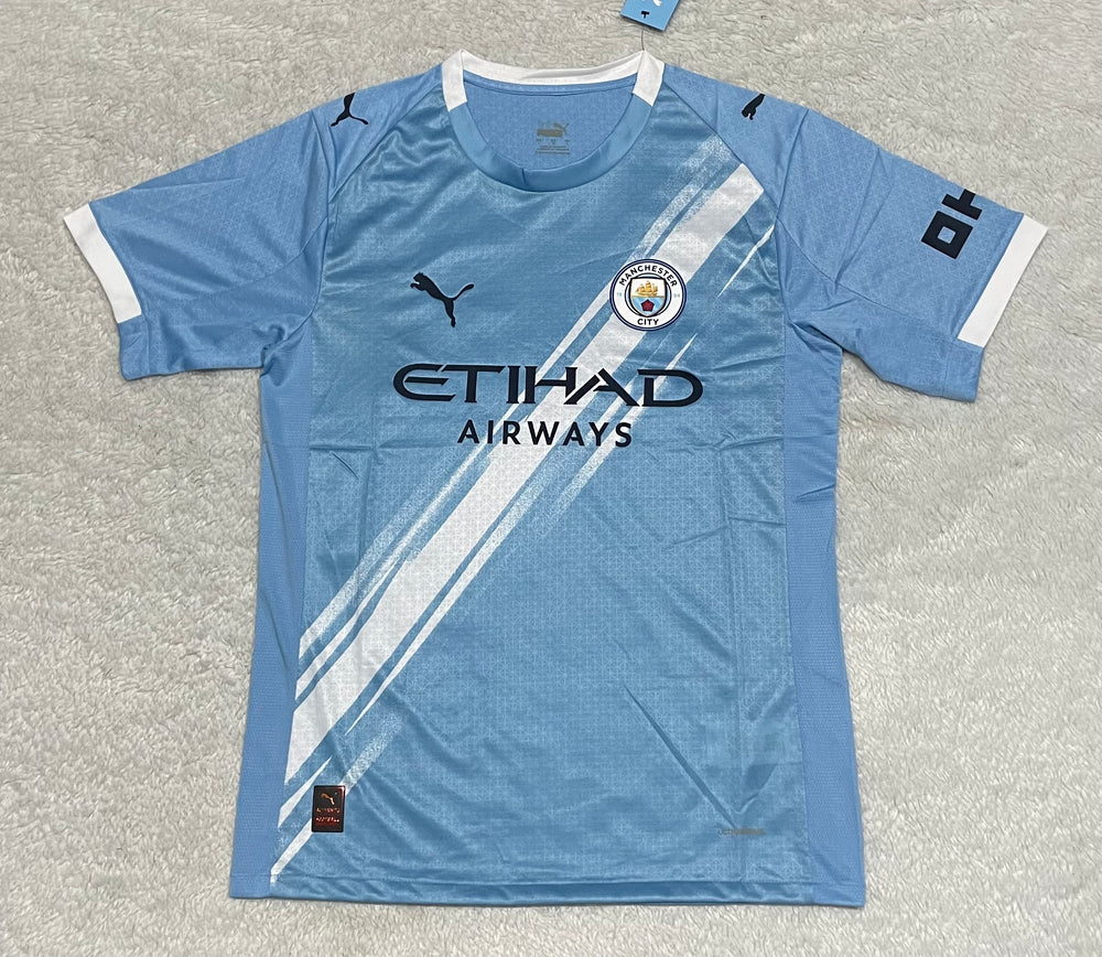 camisa camiseta blusa do manchester city nova lançamento da temporada 2025/26 25/26 i 1 titular principal primeira home azul masculina versão jogador tailandesa réplica pro mantos haaland