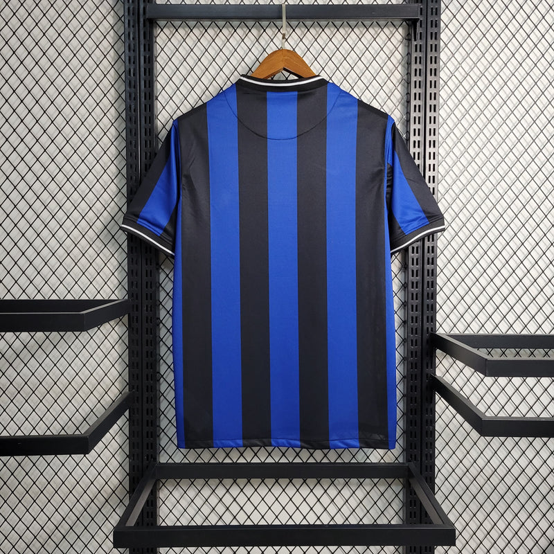 comprar-camisa-camiseta-blusa-do-da-inter-de-milão-internazionale-retrô-azul-e-preta-com-preto-listrada-listras-pirealli-final-título-campeão-da-champions-league-da-temporada-2009/2010-09/10-masculina-versão-modelo-torcedor