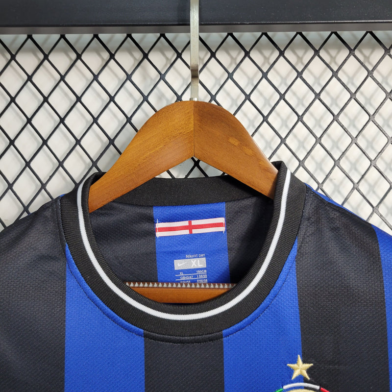 comprar-camisa-camiseta-blusa-do-da-inter-de-milão-internazionale-retrô-azul-e-preta-com-preto-listrada-listras-pirealli-final-título-campeão-da-champions-league-da-temporada-2009/2010-09/10-masculina-versão-modelo-torcedor